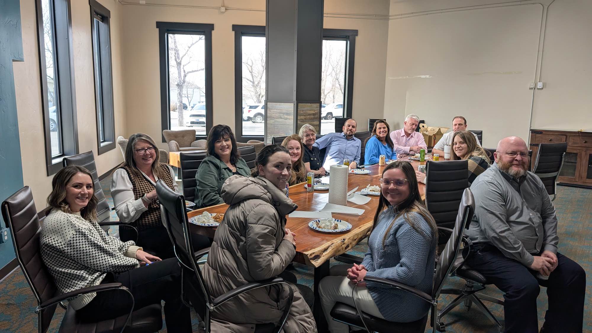 Casual meeting of diverse business team analyzing financial data
